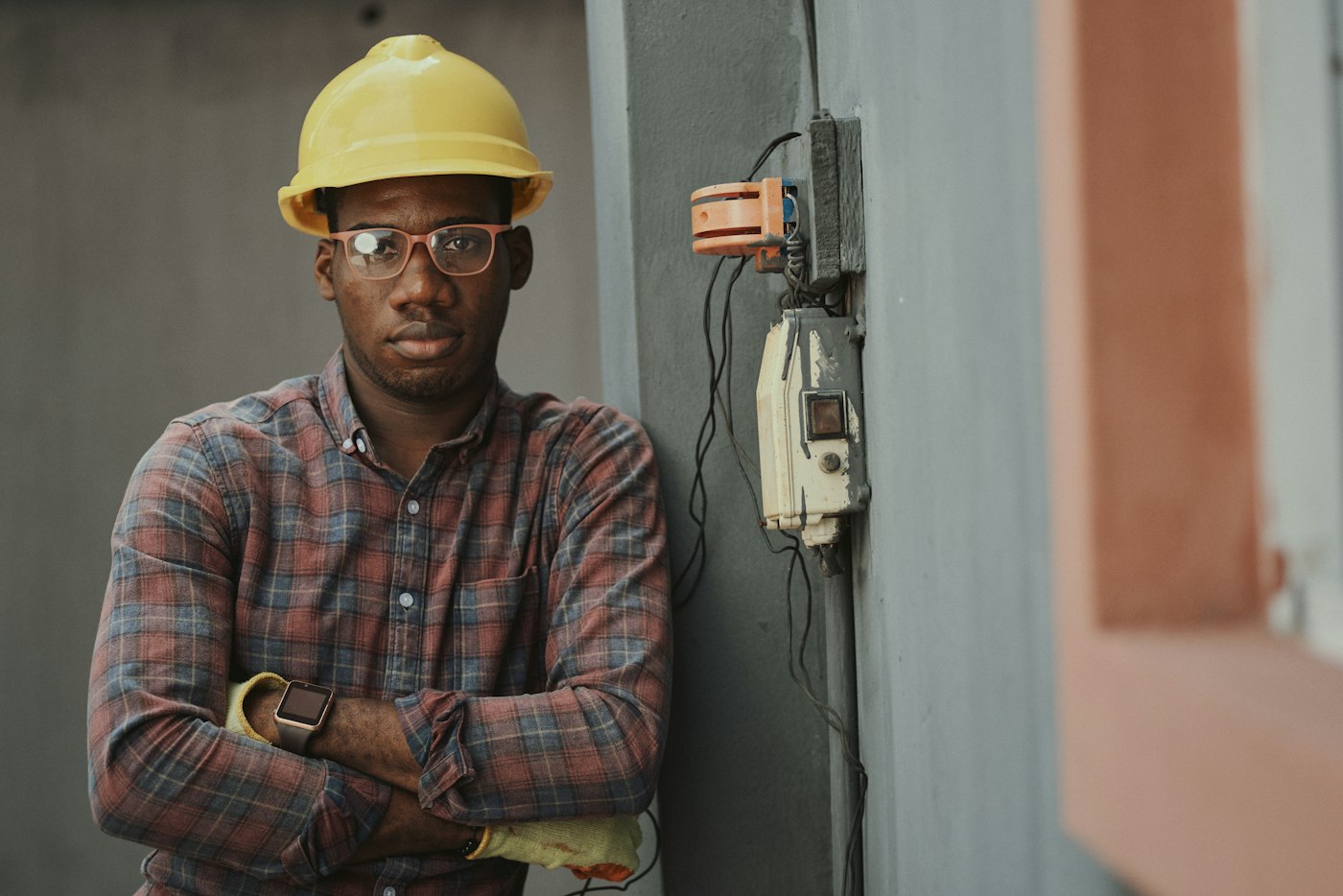 Electrician working at a home electrical panel